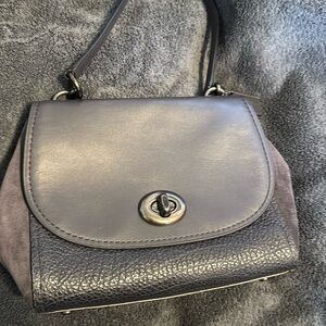 Coach bag, no long strap, color is dark gray